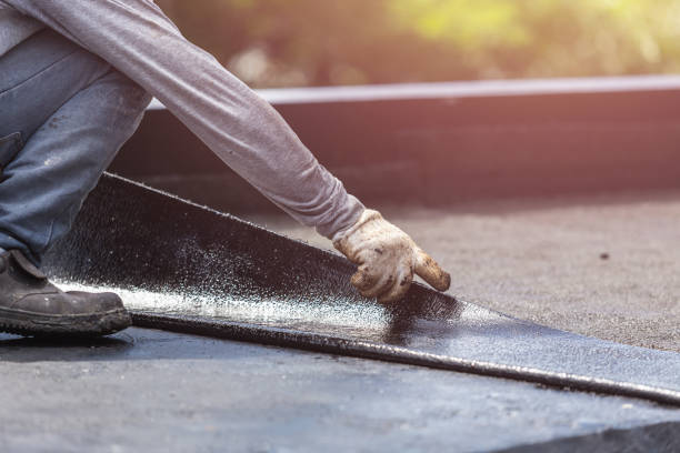 Professional Emergency Waterproofing technician working in Harrisburg, NC